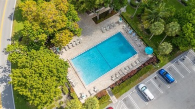 Step into this lower penthouse condo where vintage charm meets on Palm-Aire Country Club and Resort - Palms in Florida - for sale on GolfHomes.com, golf home, golf lot