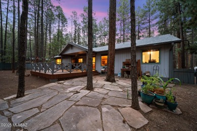Escape to the pines in this 3 bed, 2.5 bath mountain retreat in on Pinetop Lakes Country Club in Arizona - for sale on GolfHomes.com, golf home, golf lot