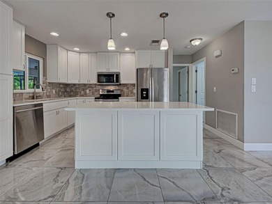 One or more photo(s) has been virtually staged. A Must See! This on Sarasota National Golf Club in Florida - for sale on GolfHomes.com, golf home, golf lot