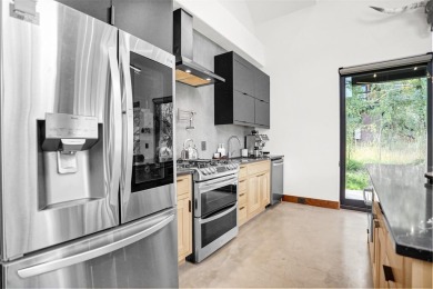 This 4-bedroom, 4-bath, 2,892 sq ft residence is a rare find in on Raven Golf Club At Three Peaks in Colorado - for sale on GolfHomes.com, golf home, golf lot