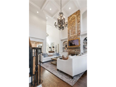 Privately tucked behind a long, tree-lined driveway and greeted on Chateau Elan Golf Club  in Georgia - for sale on GolfHomes.com, golf home, golf lot