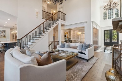 Privately tucked behind a long, tree-lined driveway and greeted on Chateau Elan Golf Club  in Georgia - for sale on GolfHomes.com, golf home, golf lot