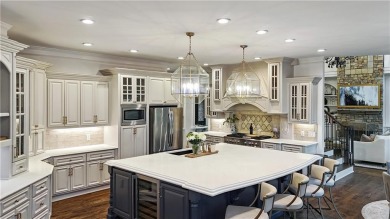 Privately tucked behind a long, tree-lined driveway and greeted on Chateau Elan Golf Club  in Georgia - for sale on GolfHomes.com, golf home, golf lot