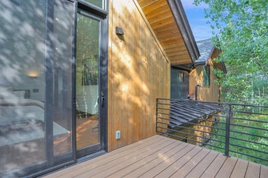 This 4-bedroom, 4-bath, 2,892 sq ft residence is a rare find in on Raven Golf Club At Three Peaks in Colorado - for sale on GolfHomes.com, golf home, golf lot