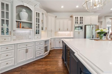 Privately tucked behind a long, tree-lined driveway and greeted on Chateau Elan Golf Club  in Georgia - for sale on GolfHomes.com, golf home, golf lot