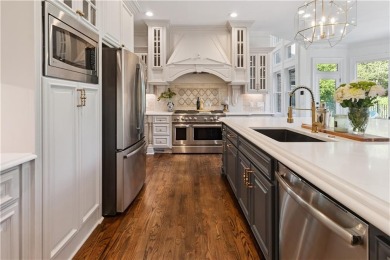 Privately tucked behind a long, tree-lined driveway and greeted on Chateau Elan Golf Club  in Georgia - for sale on GolfHomes.com, golf home, golf lot