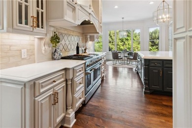 Privately tucked behind a long, tree-lined driveway and greeted on Chateau Elan Golf Club  in Georgia - for sale on GolfHomes.com, golf home, golf lot
