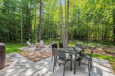 Your wooded sanctuary awaits! Escape to this stunning, newly on Canadian Lakes Country Club-The Royal Course in Michigan - for sale on GolfHomes.com, golf home, golf lot