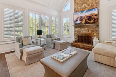 Privately tucked behind a long, tree-lined driveway and greeted on Chateau Elan Golf Club  in Georgia - for sale on GolfHomes.com, golf home, golf lot