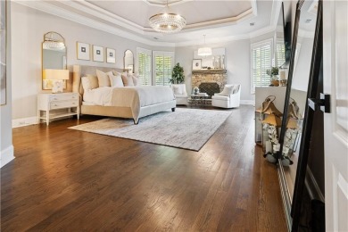 Privately tucked behind a long, tree-lined driveway and greeted on Chateau Elan Golf Club  in Georgia - for sale on GolfHomes.com, golf home, golf lot