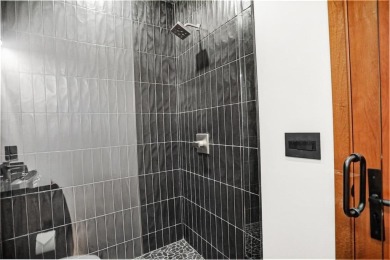 This 4-bedroom, 4-bath, 2,892 sq ft residence is a rare find in on Raven Golf Club At Three Peaks in Colorado - for sale on GolfHomes.com, golf home, golf lot