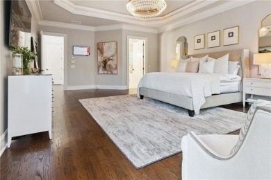 Privately tucked behind a long, tree-lined driveway and greeted on Chateau Elan Golf Club  in Georgia - for sale on GolfHomes.com, golf home, golf lot