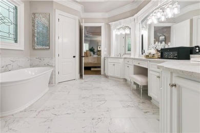 Privately tucked behind a long, tree-lined driveway and greeted on Chateau Elan Golf Club  in Georgia - for sale on GolfHomes.com, golf home, golf lot