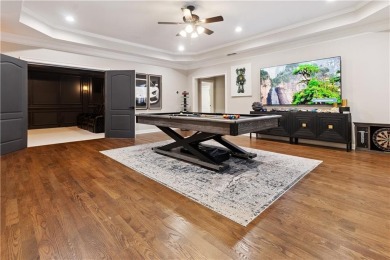 Privately tucked behind a long, tree-lined driveway and greeted on Chateau Elan Golf Club  in Georgia - for sale on GolfHomes.com, golf home, golf lot
