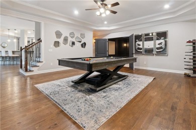 Privately tucked behind a long, tree-lined driveway and greeted on Chateau Elan Golf Club  in Georgia - for sale on GolfHomes.com, golf home, golf lot