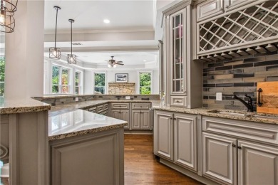 Privately tucked behind a long, tree-lined driveway and greeted on Chateau Elan Golf Club  in Georgia - for sale on GolfHomes.com, golf home, golf lot
