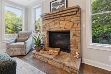 Privately tucked behind a long, tree-lined driveway and greeted on Chateau Elan Golf Club  in Georgia - for sale on GolfHomes.com, golf home, golf lot