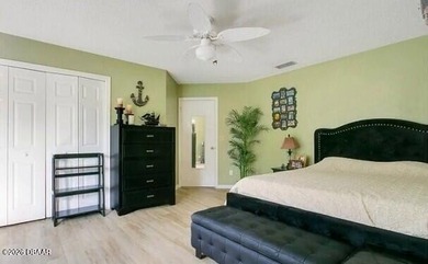 Enjoy stunning water views of the golf course from the back on The Club At Pelican Bay - North Course in Florida - for sale on GolfHomes.com, golf home, golf lot