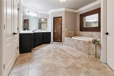 Privately tucked behind a long, tree-lined driveway and greeted on Chateau Elan Golf Club  in Georgia - for sale on GolfHomes.com, golf home, golf lot