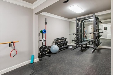 Privately tucked behind a long, tree-lined driveway and greeted on Chateau Elan Golf Club  in Georgia - for sale on GolfHomes.com, golf home, golf lot