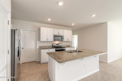 Discover this bright and spacious 5-bedroom, 3-bath home in The on Venetian Bay Golf Course in Florida - for sale on GolfHomes.com, golf home, golf lot