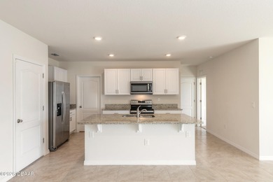 Discover this bright and spacious 5-bedroom, 3-bath home in The on Venetian Bay Golf Course in Florida - for sale on GolfHomes.com, golf home, golf lot