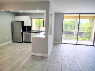 Beautifully UPDATED corner unit in a desirable 55+ community on Colony West Country Club in Florida - for sale on GolfHomes.com, golf home, golf lot