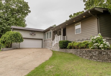 Beautifully updated 4 bedroom, 2 bathroom home in Village Green on Twin Lakes Golf Club in Arkansas - for sale on GolfHomes.com, golf home, golf lot