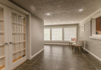 Beautifully updated 4 bedroom, 2 bathroom home in Village Green on Twin Lakes Golf Club in Arkansas - for sale on GolfHomes.com, golf home, golf lot