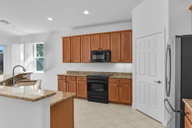 Live the resort lifestyle in this perfectly located, spacious on Hammock Bay in Florida - for sale on GolfHomes.com, golf home, golf lot