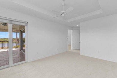 Live the resort lifestyle in this perfectly located, spacious on Hammock Bay in Florida - for sale on GolfHomes.com, golf home, golf lot