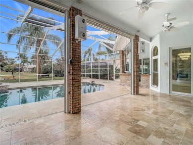 Under contract-accepting backup offers. Exquisite Home on the on East Lake Woodlands Country Club in Florida - for sale on GolfHomes.com, golf home, golf lot