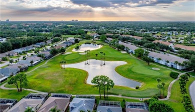 Enjoy breathtaking views of the 9th hole from this beautifully on Villages of Country Creek Golf Course in Florida - for sale on GolfHomes.com, golf home, golf lot