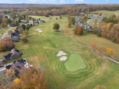 Discover the epitome of living in the prestigious golf course on Crooked Creek Golf Club in Kentucky - for sale on GolfHomes.com, golf home, golf lot