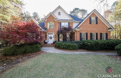 Presenting a stately traditional home where striking elements on Jennings Mill Country Club in Georgia - for sale on GolfHomes.com, golf home, golf lot