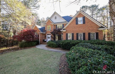 Presenting a stately traditional home where striking elements on Jennings Mill Country Club in Georgia - for sale on GolfHomes.com, golf home, golf lot