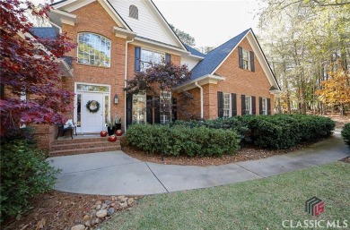 Presenting a stately traditional home where striking elements on Jennings Mill Country Club in Georgia - for sale on GolfHomes.com, golf home, golf lot