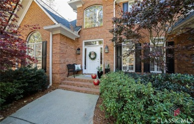 Presenting a stately traditional home where striking elements on Jennings Mill Country Club in Georgia - for sale on GolfHomes.com, golf home, golf lot