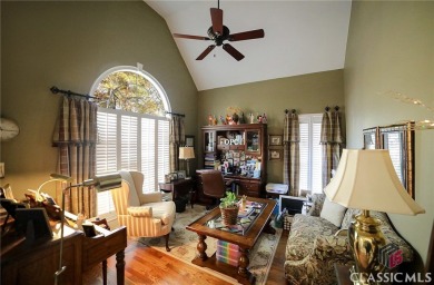 Presenting a stately traditional home where striking elements on Jennings Mill Country Club in Georgia - for sale on GolfHomes.com, golf home, golf lot