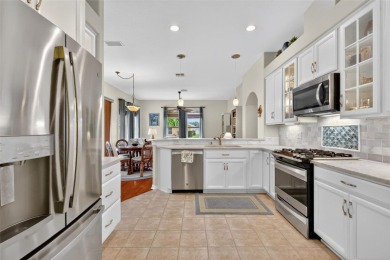 Welcome to this beautifully landscaped Scarsborough model pool on Monarch At Royal Highlands in Florida - for sale on GolfHomes.com, golf home, golf lot