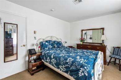 Welcome to 423 D Woodbridge, Ridge, a delightful one-bedroom on Leisure Village Golf Course in New York - for sale on GolfHomes.com, golf home, golf lot