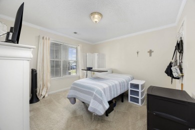 Cozy Condo with Golf Course View just a short drive to the on Palmetto Greens Golf and Country Club in South Carolina - for sale on GolfHomes.com, golf home, golf lot