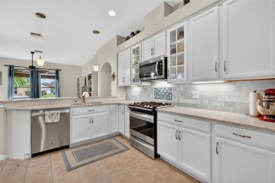 Welcome to this beautifully landscaped Scarsborough model pool on Monarch At Royal Highlands in Florida - for sale on GolfHomes.com, golf home, golf lot