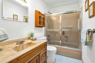 Welcome to 423 D Woodbridge, Ridge, a delightful one-bedroom on Leisure Village Golf Course in New York - for sale on GolfHomes.com, golf home, golf lot