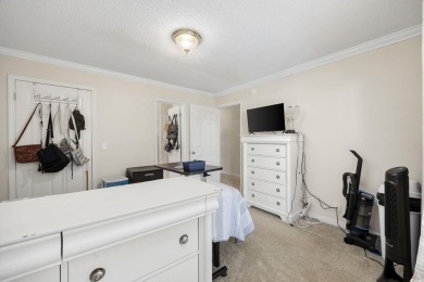 Cozy Condo with Golf Course View just a short drive to the on Palmetto Greens Golf and Country Club in South Carolina - for sale on GolfHomes.com, golf home, golf lot