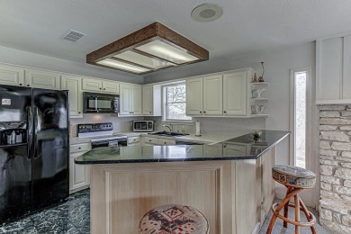 Welcome to this awesome townhouse sitting on Hole #9 Slick Rock on Slick Rock Golf Course - Horseshoe Bay in Texas - for sale on GolfHomes.com, golf home, golf lot