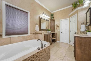 Discover elegance and comfort in this stunning 4-bedroom on Palo Duro Creek Golf Club in Texas - for sale on GolfHomes.com, golf home, golf lot