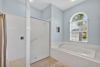 Welcome to this beautifully landscaped Scarsborough model pool on Monarch At Royal Highlands in Florida - for sale on GolfHomes.com, golf home, golf lot