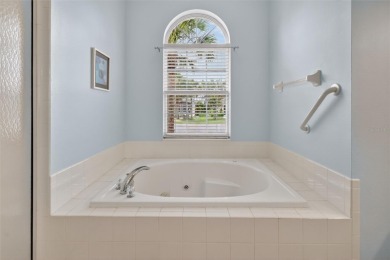 Welcome to this beautifully landscaped Scarsborough model pool on Monarch At Royal Highlands in Florida - for sale on GolfHomes.com, golf home, golf lot