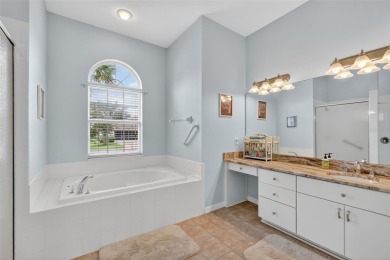 Welcome to this beautifully landscaped Scarsborough model pool on Monarch At Royal Highlands in Florida - for sale on GolfHomes.com, golf home, golf lot